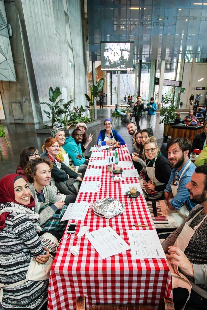 The Foodways team gathers for a planning meeting in the atrium at Fed Square.